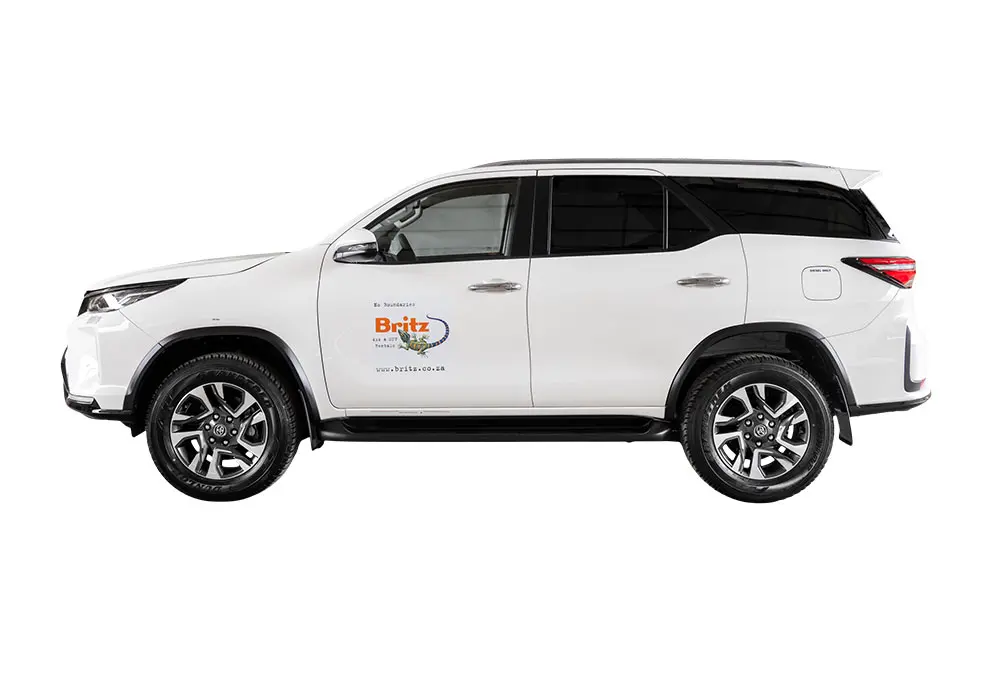 White Toyota Fortuner SUV rental by Britz, ideal for South African adventure travel.